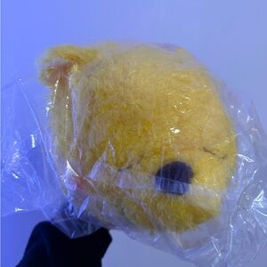 Disney Winnie the Pooh laying down plushie